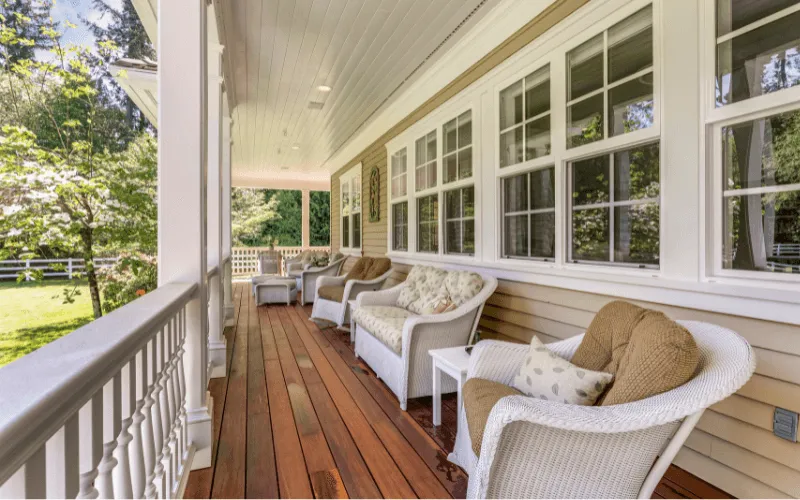 perfect-wrap-around stained-deck-white-railings_result
